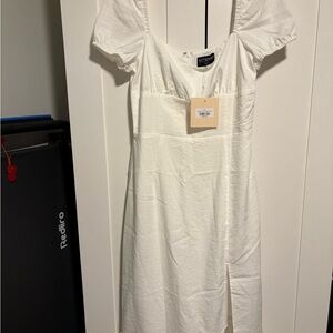 Kittenish Ivory Dress with Puff Sleeves